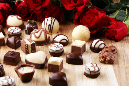 Chocolates Pralines and Roses Perfect Combination for the Woman 