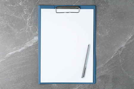 open paper notepad on marble table
