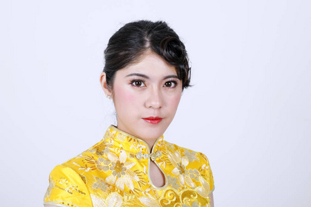 Young beautiful woman in Chinese Cheongsam modern makeup 