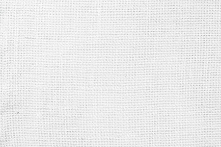背景为白色抽象棉毛巾模型面料。艺术灰壁亚麻帆布纹理的布艺壁纸。图案和复制空间的布毯或窗帘，用于文字装饰。
