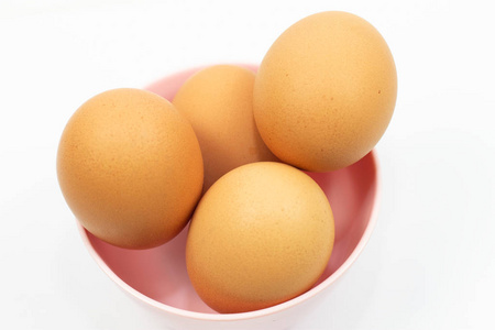 白底碗里的鸡蛋。