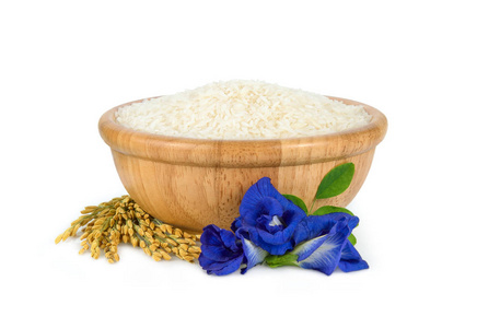 white rice Thai Jasmine rice in the wooden bowl with unmilled 