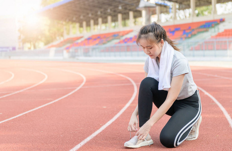 Athlete girl trying running shoes getting ready for jogging 