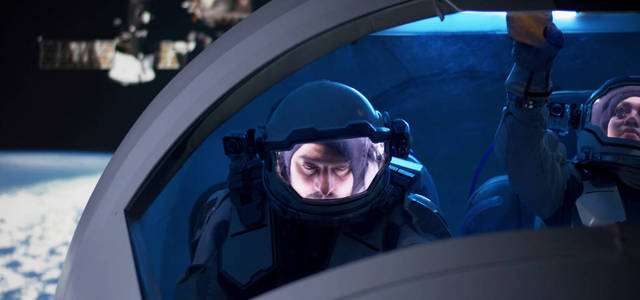 宇航员从太空船窗口望出去图片