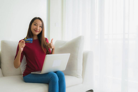 Portrait beautiful young asian women using computer laptop with 