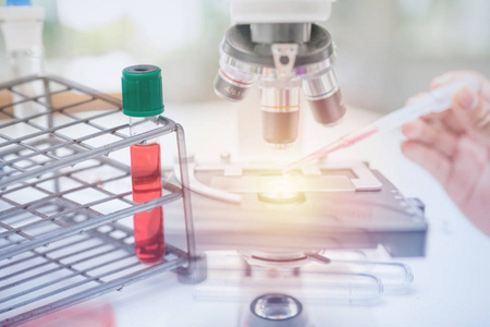 Microscope on the table in laboratory room 