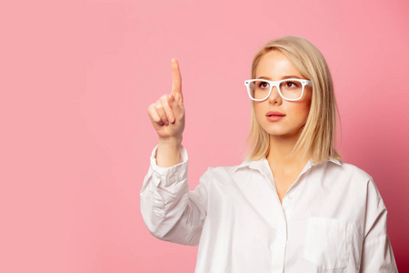 White woman in shirt and glasses 