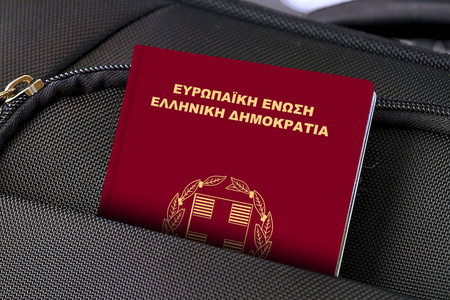 Close up of Greece Passport in Black Suitcase Pocket 