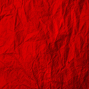 Red crumpled paper. Texture of kraft paper is red. Recycled pape