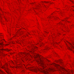 Red wrinkled paper. Texture of kraft paper is red. Recycled pape