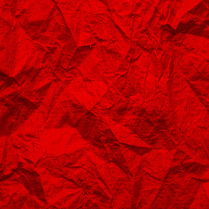 Red paper. Texture of the rumpled craft paper is red. Recycled p