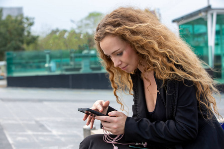 candid shot of women using mobile phone 