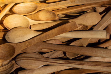 Handmade wooden kitchen utensils spoons for housewives. 