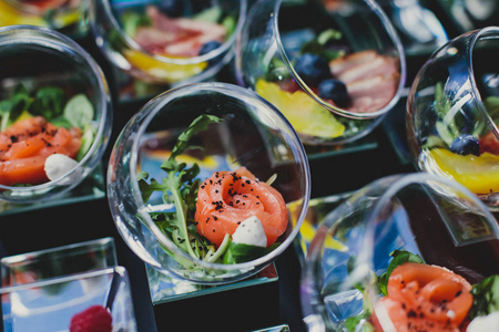 Beautifully decorated catering banquet table with different food