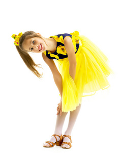 Elegant girl in a dress.Isolated on white background.