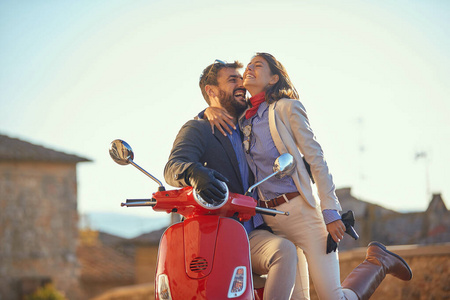 Romantic man and woman with motorcycle. Man and woman riding on 