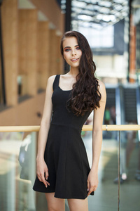 Make up beauty. Close up portrait young brunette woman in black 