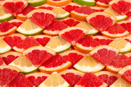 Pomelo and grapefruit slices background. 