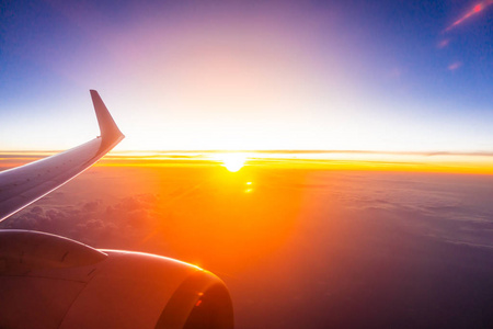 Beautiful aerial view from airplane wing on white cloud and sky 