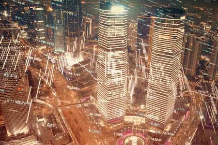 金融图表的城市景观与高楼背景多重曝光。分析概念。