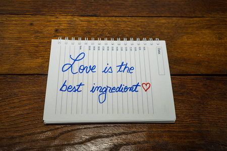 Love is the best ingredient, writing love text on paper, lovely 