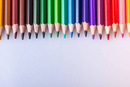  Color Pencils placed on a white background