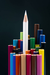 Colored pencils for drawing on a dark background. Education and 