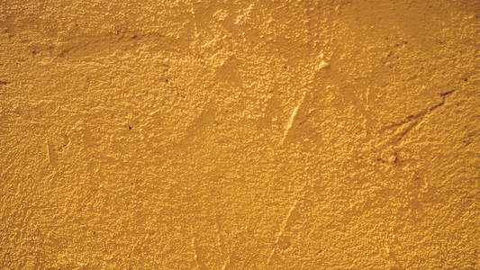 陈腐的橙色墙壁的纹理，有文字或图像的空间