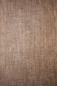 Decorative brown linen fabric textured background for interior, 