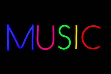 Multicolored music sign on isolated black background. 