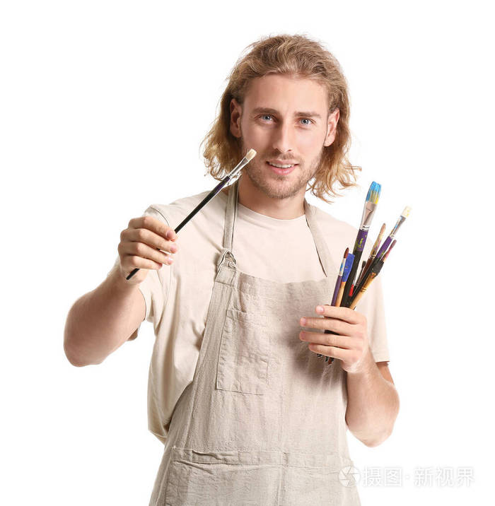 被隔离在白色上的年轻男艺术家