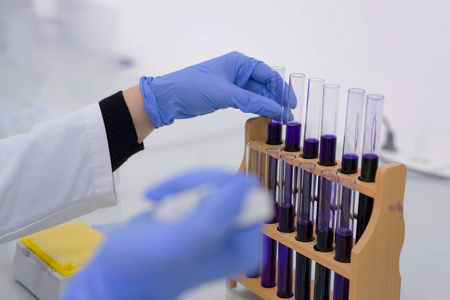 Group of  Laboratory scientists working at lab with test tubes, 