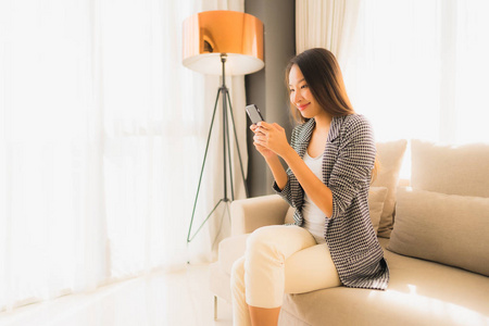 Portrait beautiful young asian women using talking mobile phone 