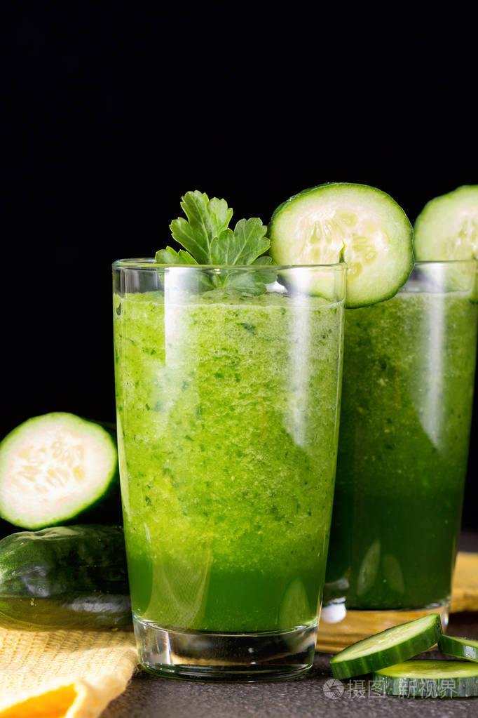 glass of fresh cucumber juice. green smoothie. detox water. heal