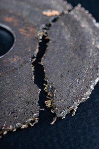 Damaged cutting disc for metal in an angle grinder. Power tools 