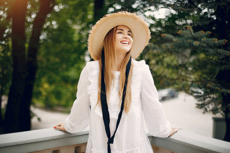 Elegant and stylish girl in a spring park