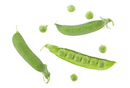 顶视图新鲜的绿色豌豆豆荚和孤立的豌豆在白坝上照片