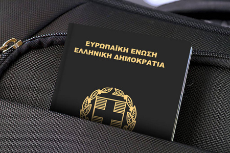 Close up of Greece Passport in Black Suitcase Pocket 