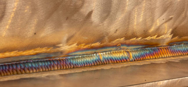 氩弧焊焊接用氩弧焊焊接不锈钢.焊接tig.彩色焊缝.照片