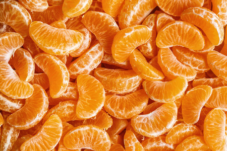 橘子段，橙色背景纹理，平铺，俯视图