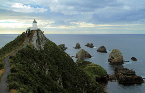 苍穹 指向 灯塔 金块 天空 海岸 峭壁 岩石 地平线 海洋