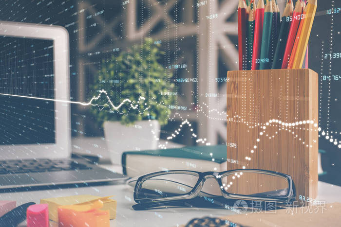 财务图表全息图桌面背景为眼镜商业概念双重曝光