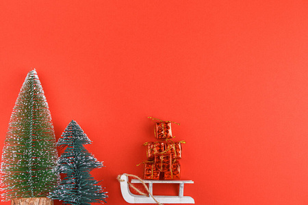 Toy tree on red background. 