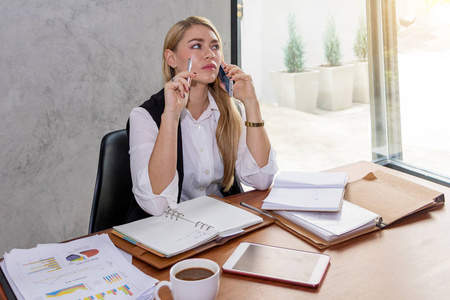 Two women are studying and teaching 