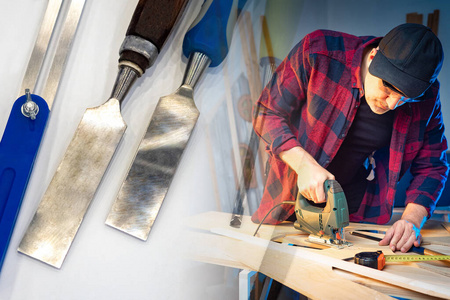 一个人用电锯工作.木匠在工作.木工培训.照片