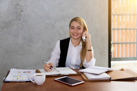 Two women are studying and teaching 