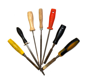 A set of different types of chisels and files. 