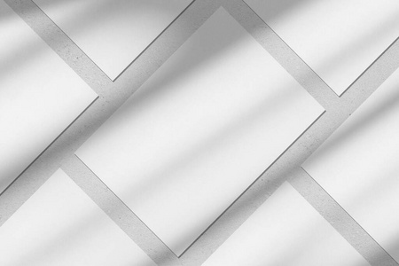 Empty white vertical rectangle poster mockups with diagonal wind