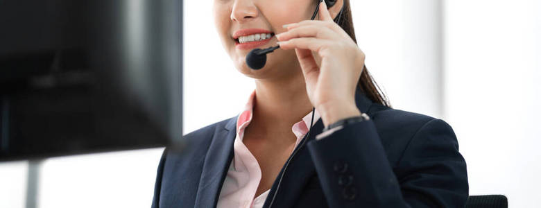 Beautiful happy smiling businesswoman operator customer support 