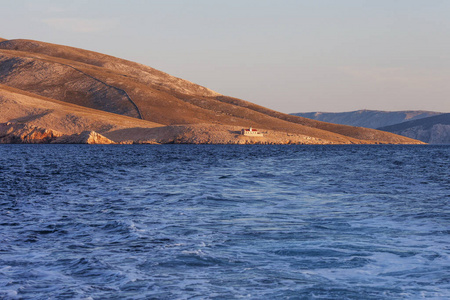 View of the sea and  mountains  on sunset or sunrise. Greatness 